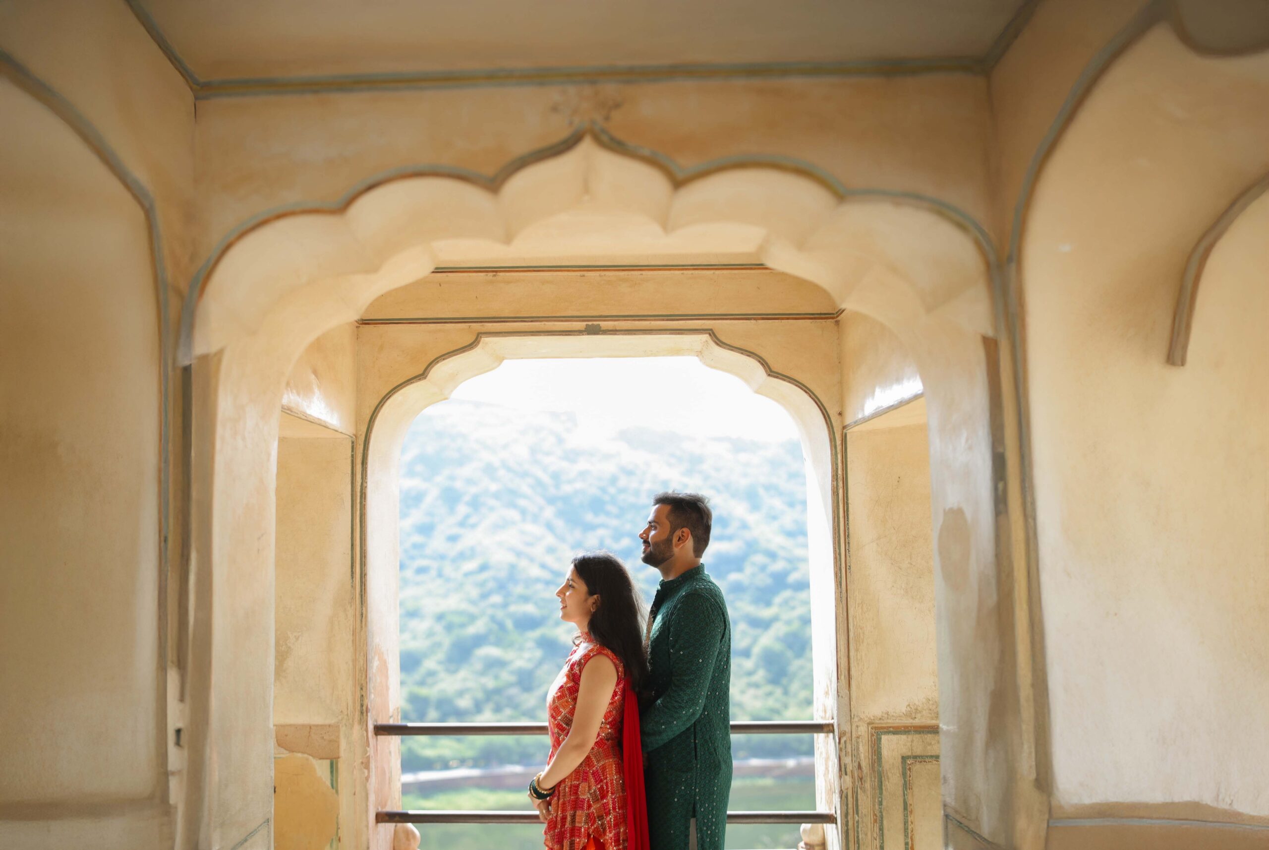 a man and woman standing in a doorway