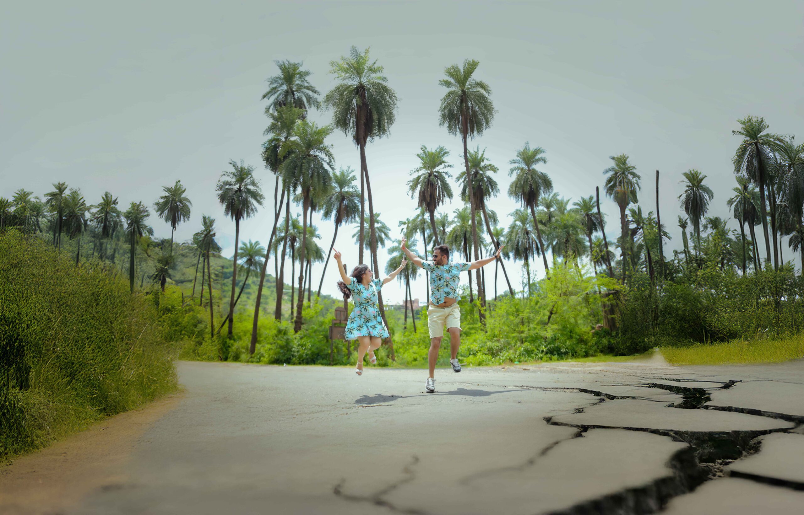 a man and woman jumping in the air